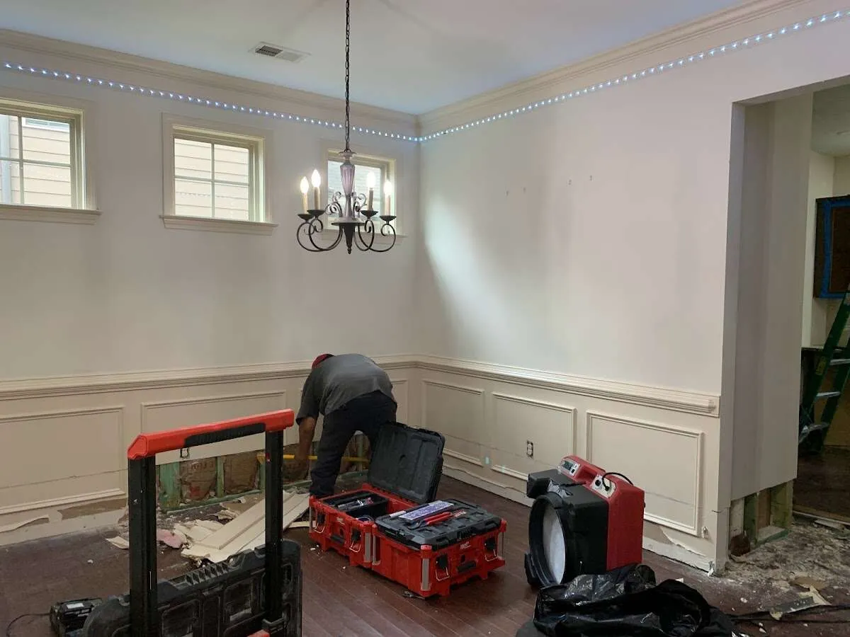 Restoration technician with professional equipment in Colts Neck